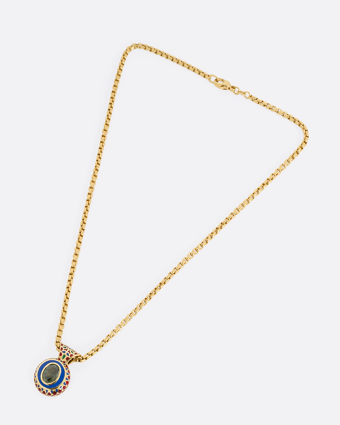 yellow gold green sapphire pendant with enamel shown diagonally