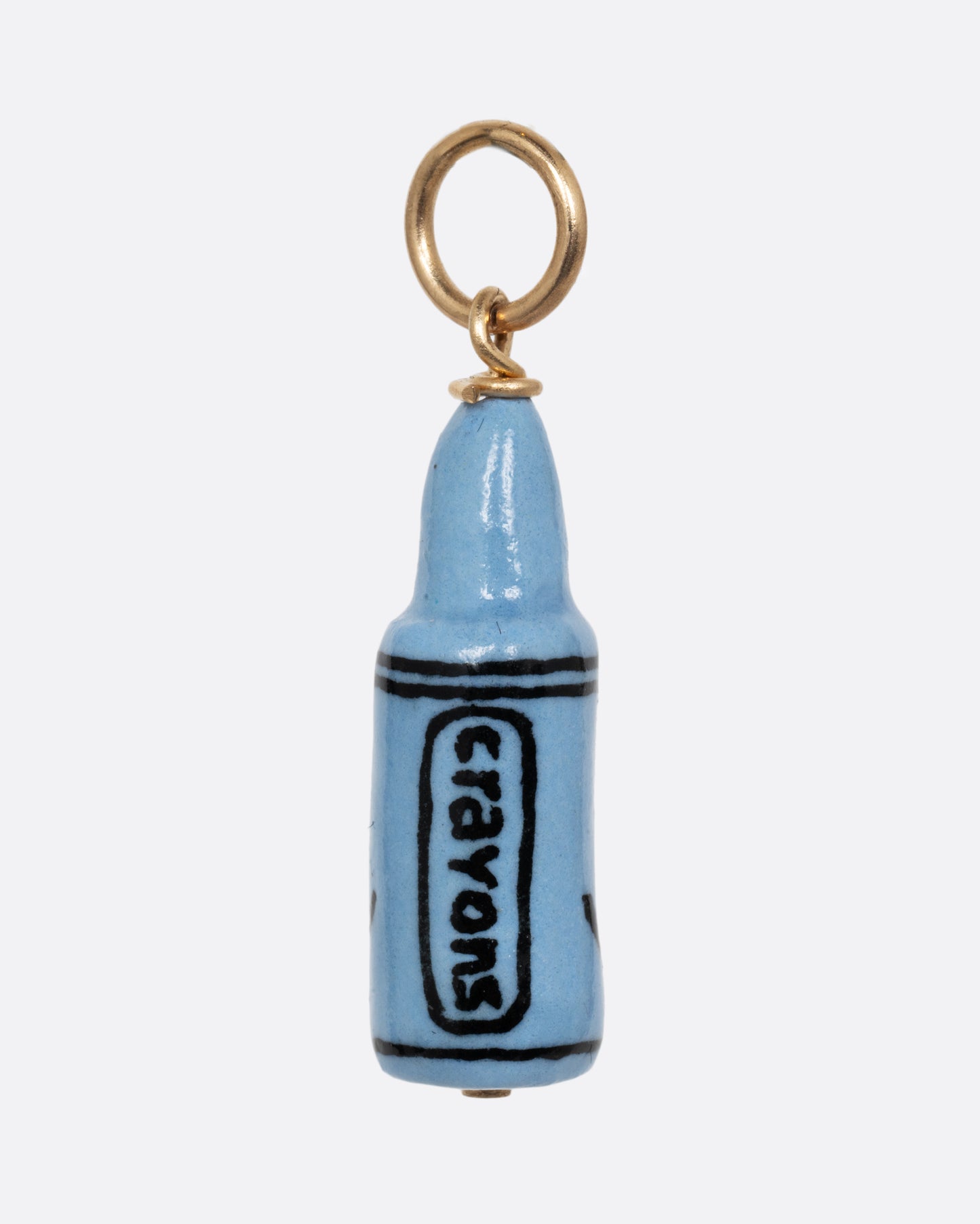 A blue crayon porcelain charm with a yellow gold bail. Shown from the back.