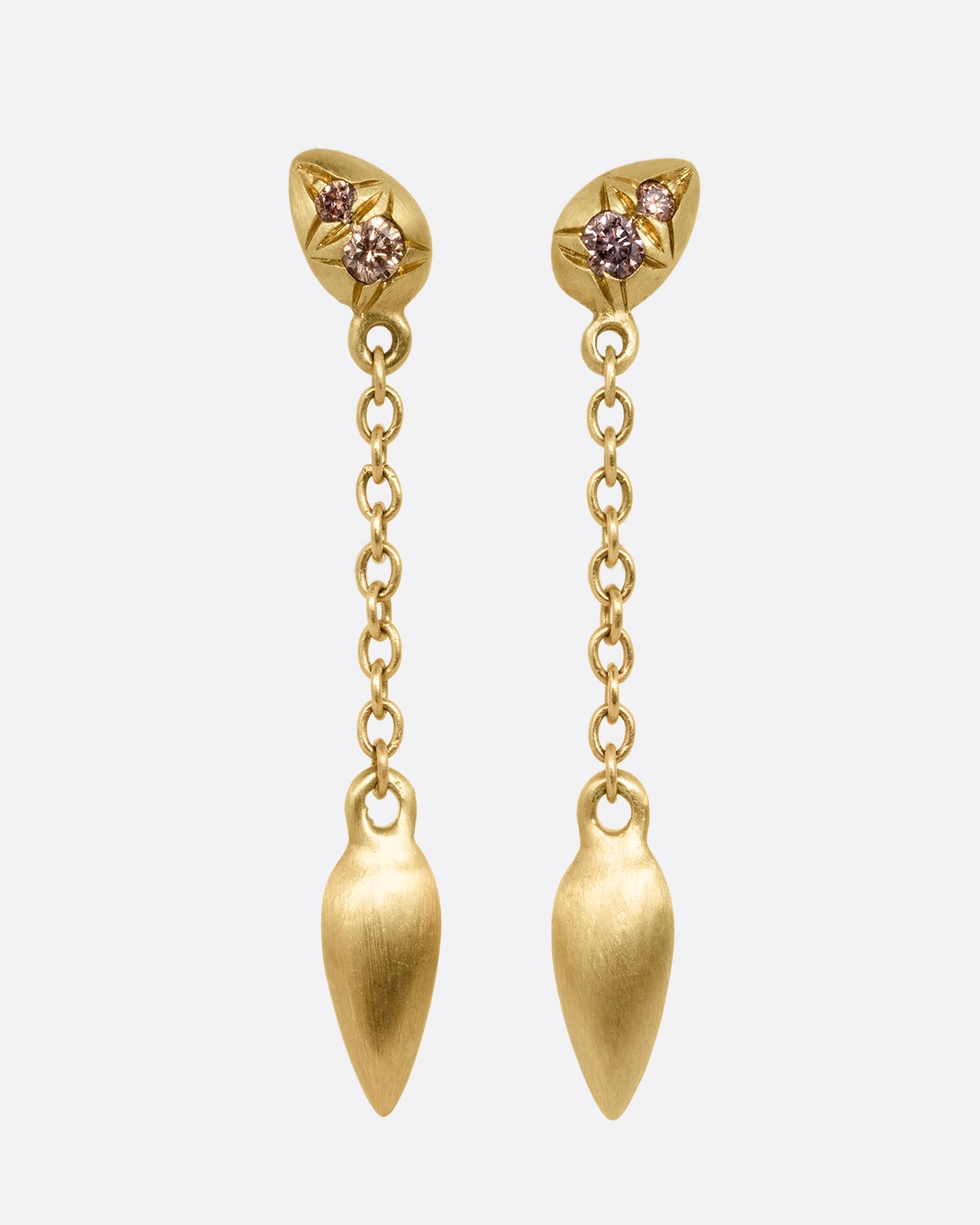 Yellow gold earrings with brown diamonds and cable chain drops. Shown from the front.