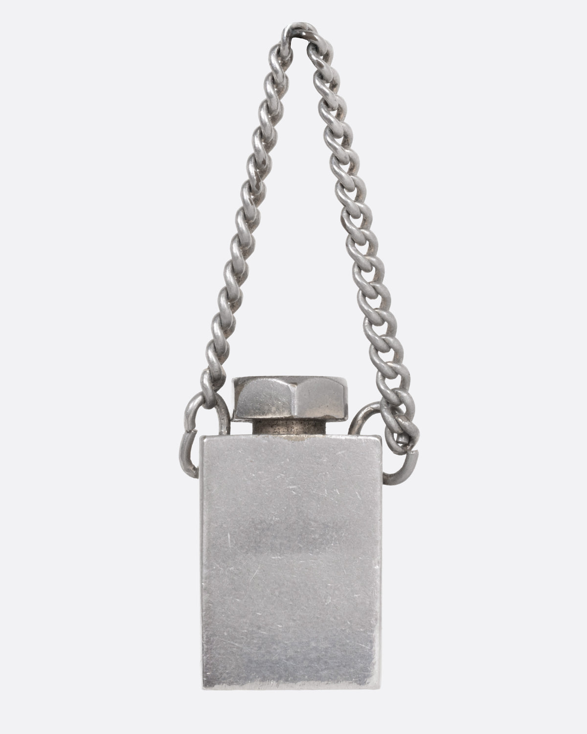 A silver rectangular perfume bottle pendant with a chain loop and twist-off wand, shown from the front.