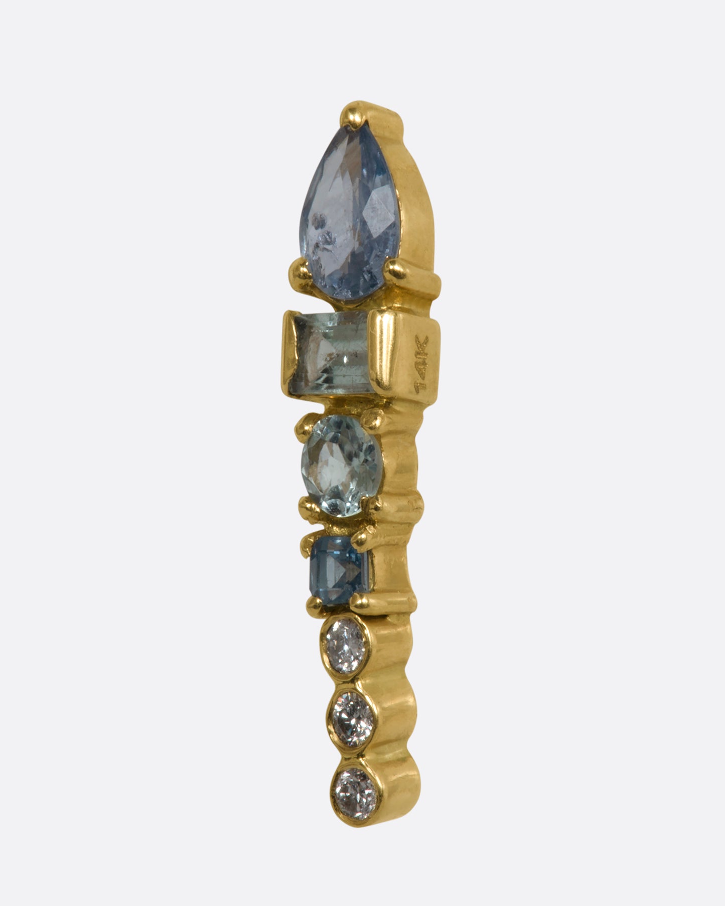 A long stud earring with an aquamarine, tanzanite, apatite, and three round diamonds stacked. Shown from the side.