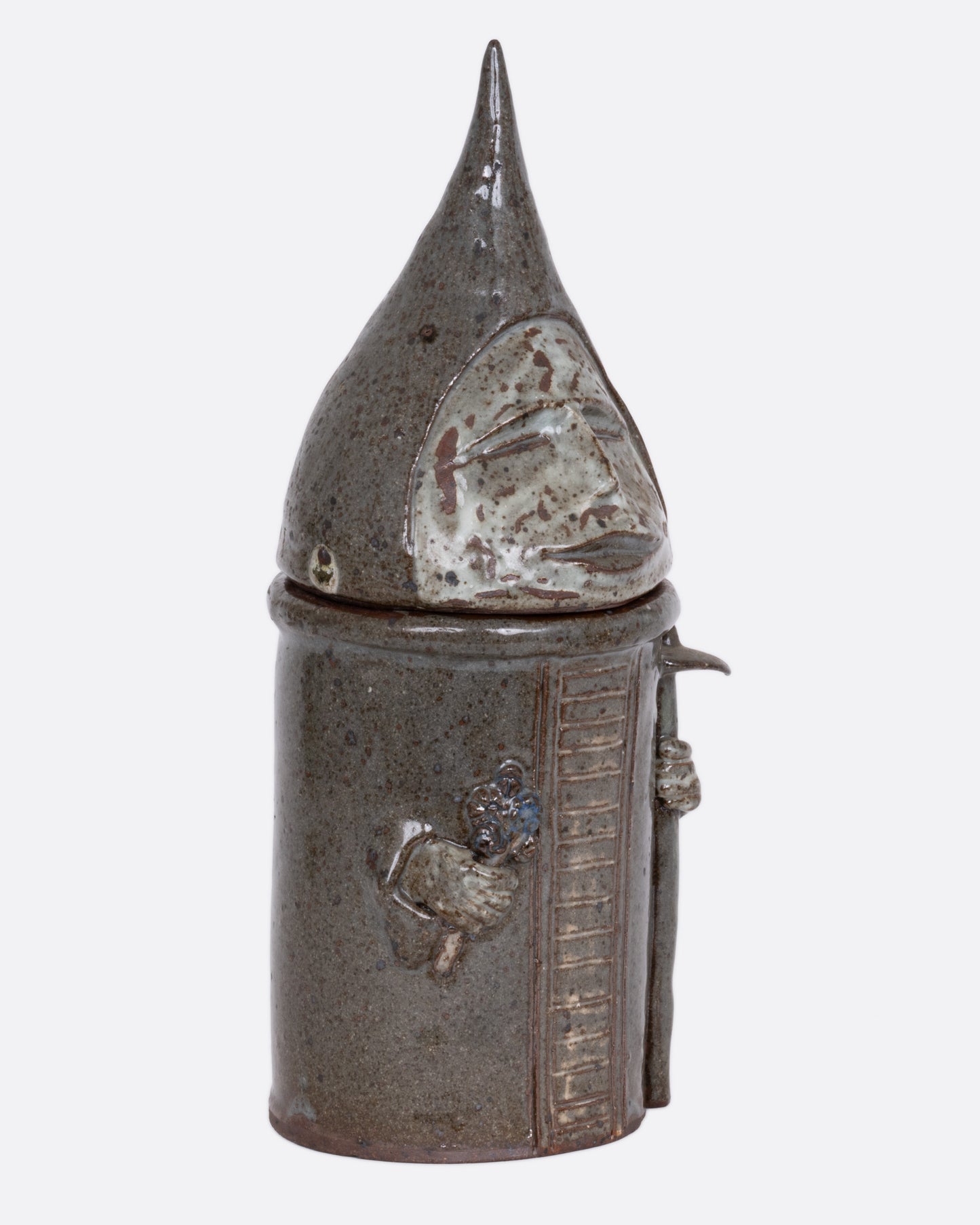 A this ceramic likeness of Saint Fiacre with a removable lid, shown from the side.