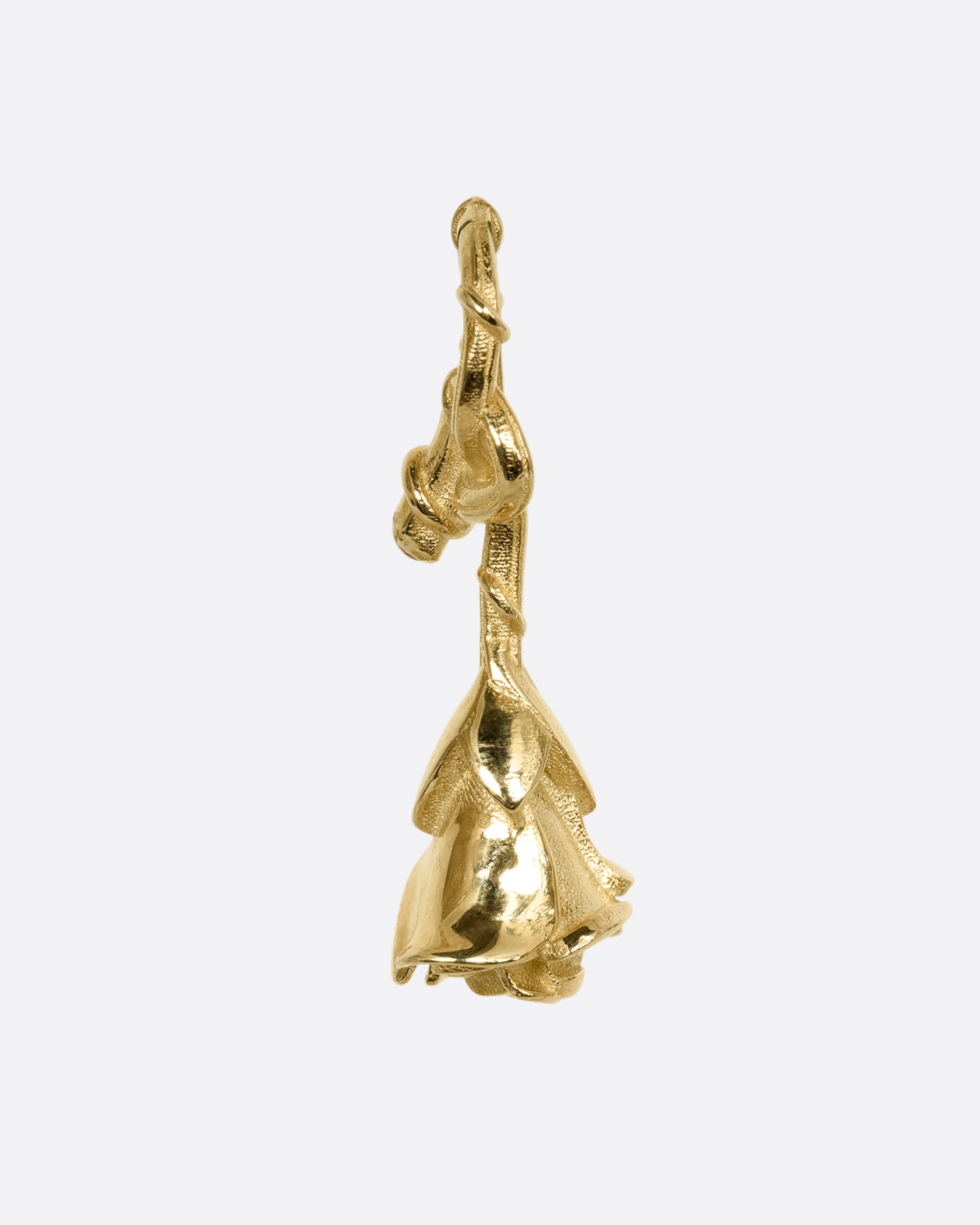 yellow gold rose charm with ruby, shown from the side