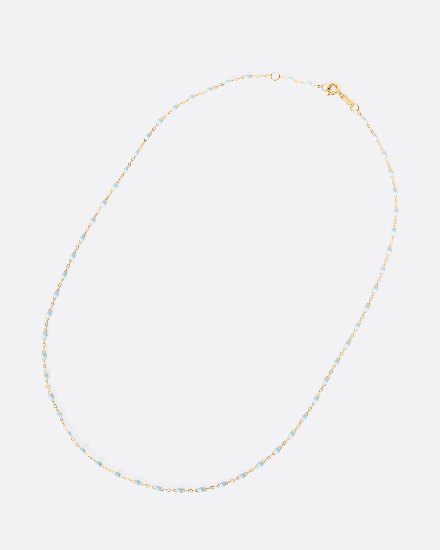 Thin 18k yellow gold chain necklace with resin beads. Each necklace is hand dipped in melted resin to create the beaded effect.