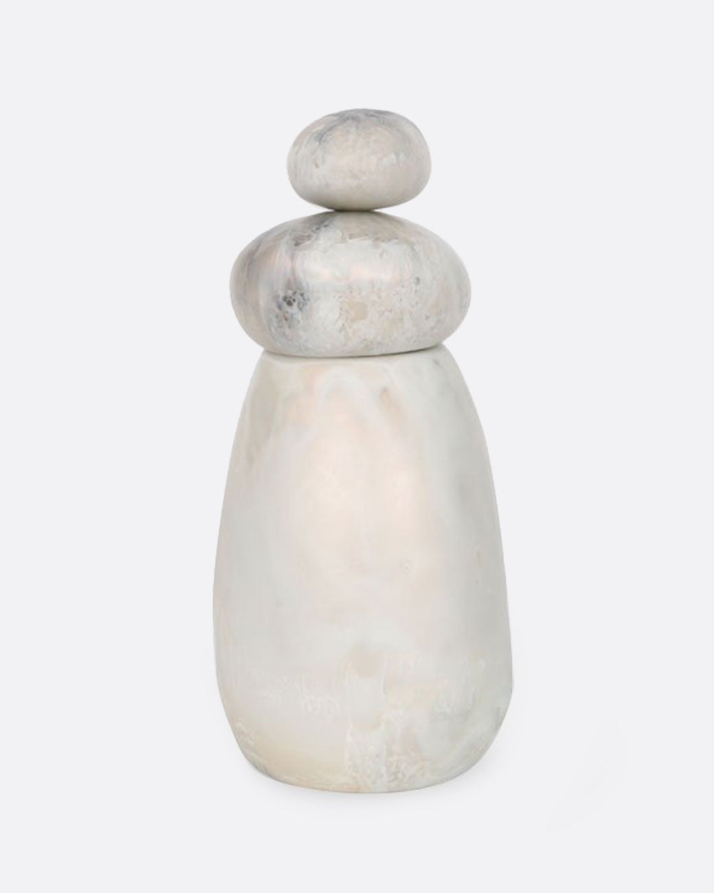 A pepper grinder with stacked resin stones. Shown from the side.