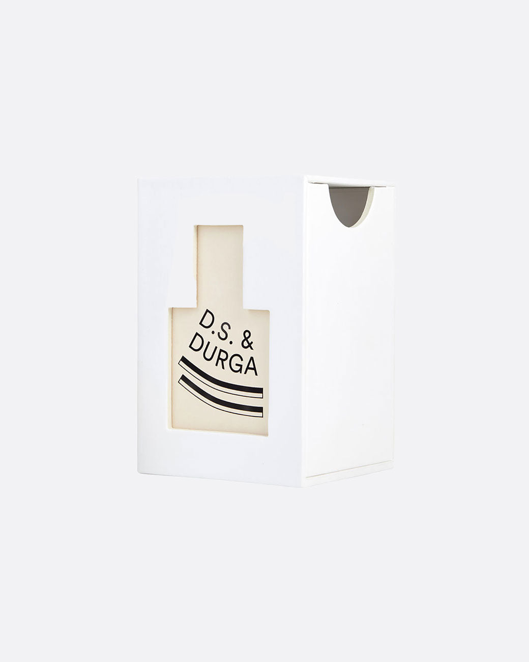 A white box with a bottle shaped cut out revealing ' D.S & Durga' in black lettering. Shown at an ange from the front.