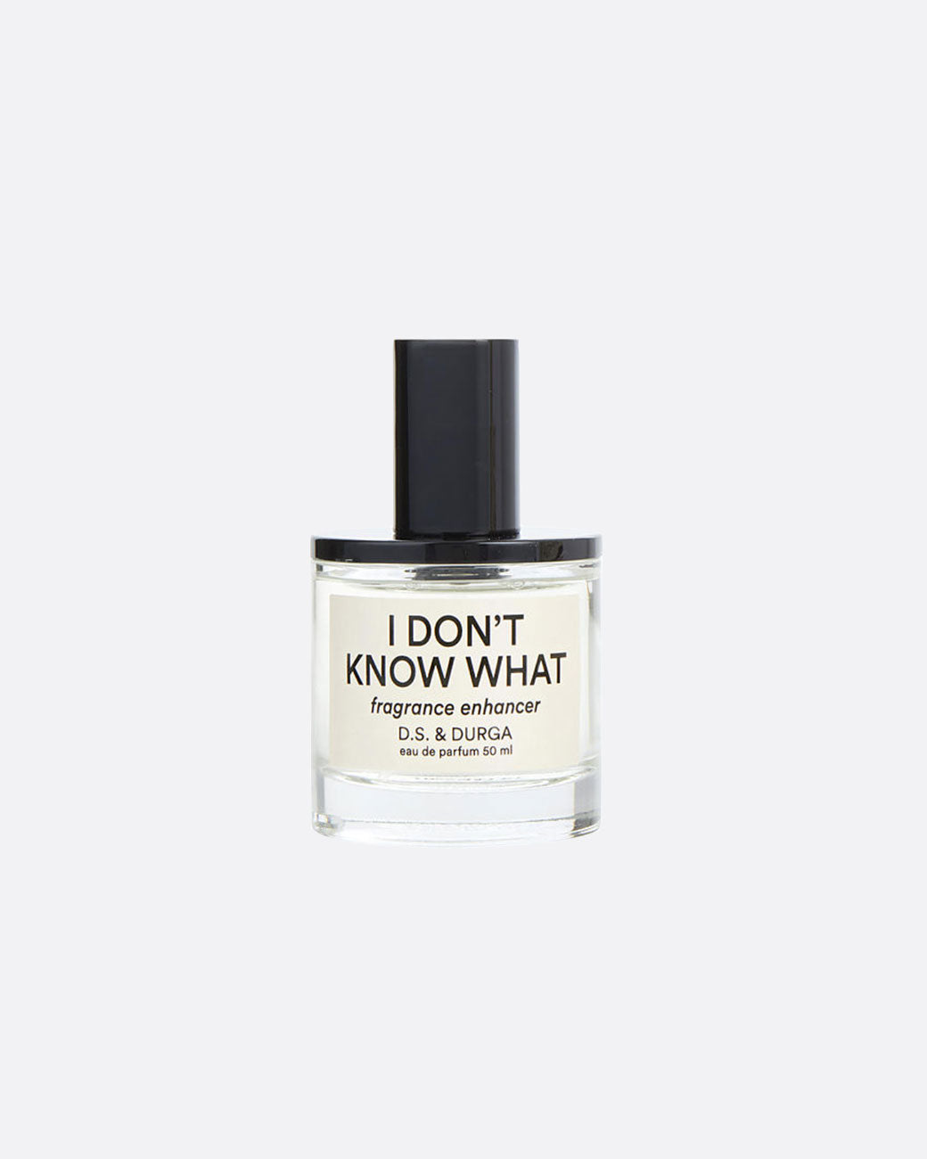 A glass perfume bottle with a black top and 'I Don't Know What fragrance enhancer D.S. & DURGA eau de perfume 50 ml' in black lettering on a white label. Shown from the front.