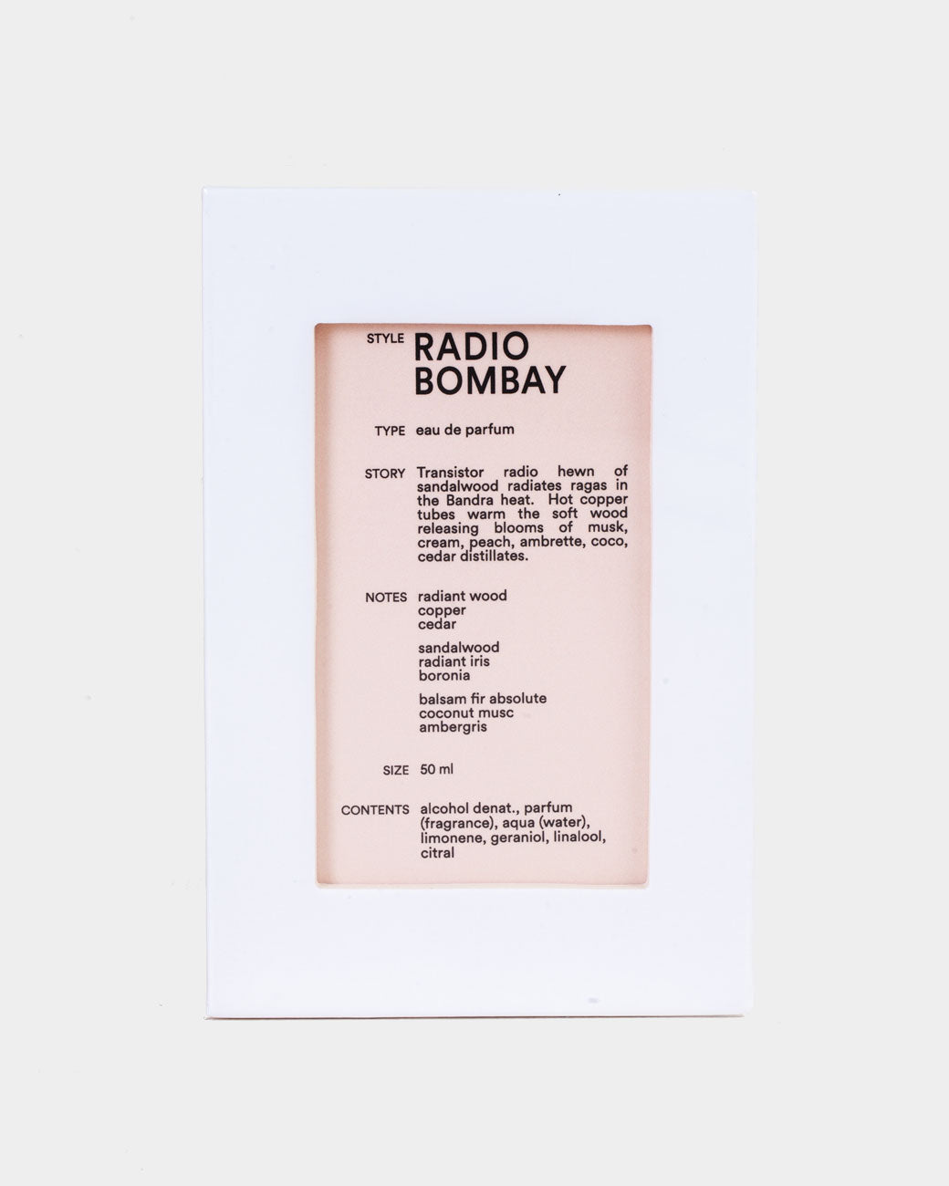 A white box with a cutout window showing product information of D.S. & Durga Eau De Parfum: Radio Bombay. Shown from the front.