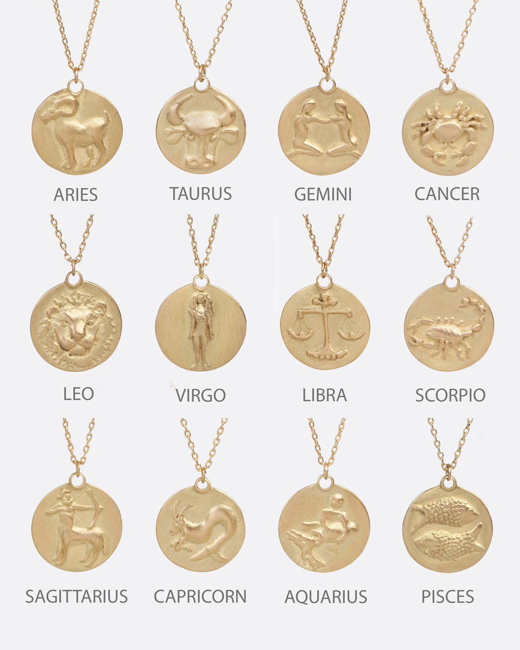 Chart depicting all twelve zodiac designs on yellow gold disc pendants