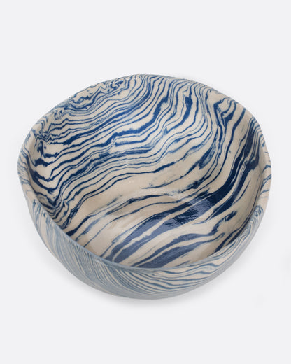 Blue and cream marbled ceramic bowl, view from above