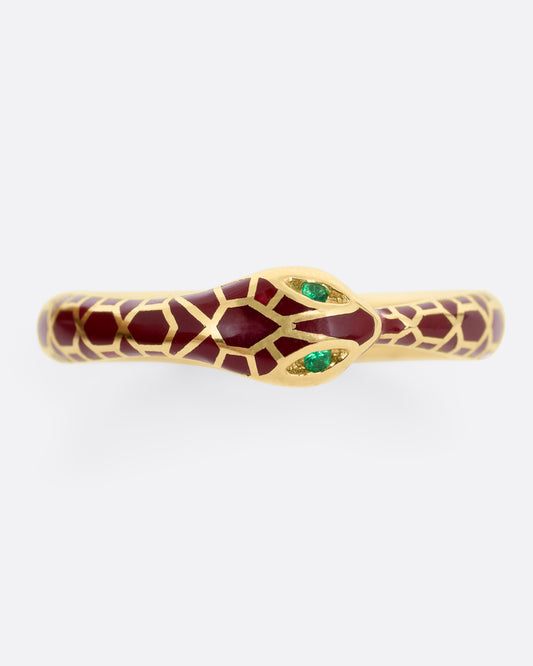 yellow gold ring with emerald and enamel shown from the top