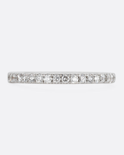 Selin Kent eternity band in 14k white gold, a slim band set all the way around with small white diamonds