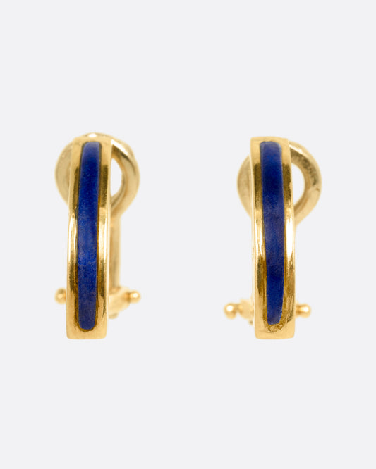A pair of yellow gold earrings with arched lapis bars, shown from the front.