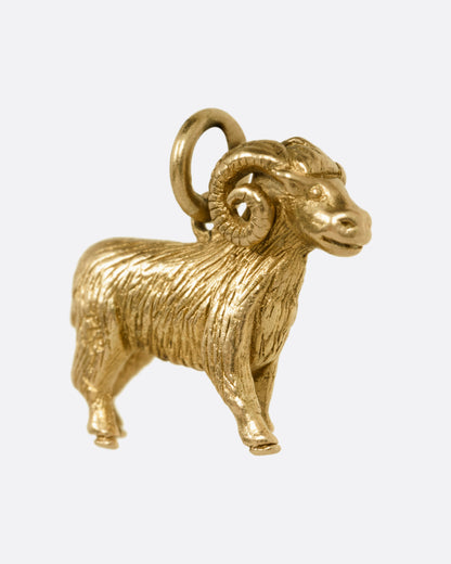 Vintage ram charm in 9k yellow gold, a detailed standing ram with curled horns, made in Birmingham in 1960
