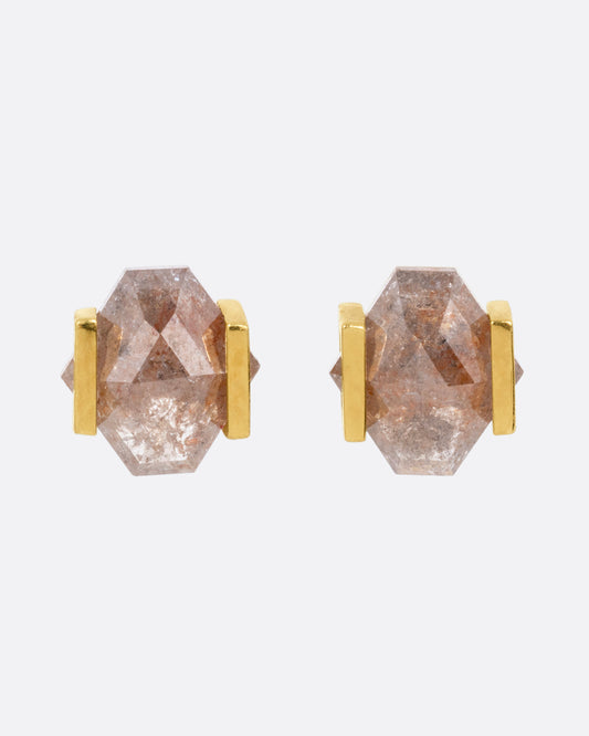 Yellow gold earrings with rustic diamonds in open rectangular settings. Shown from the front.