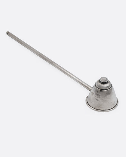 A silver candle snuffer shown from the side.
