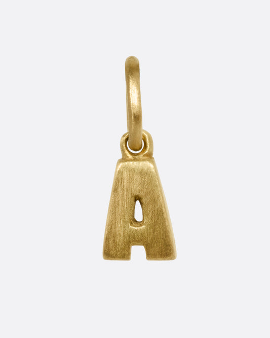 A yellow gold letter 'A' pendant shown from the front.