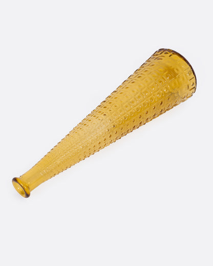 Vintage amber hobnail glass vase laid on its side