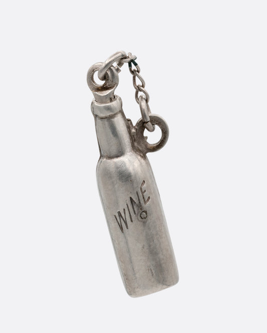 A silver wine bottle charm with a removable cork on a small chain. Shown from the front.