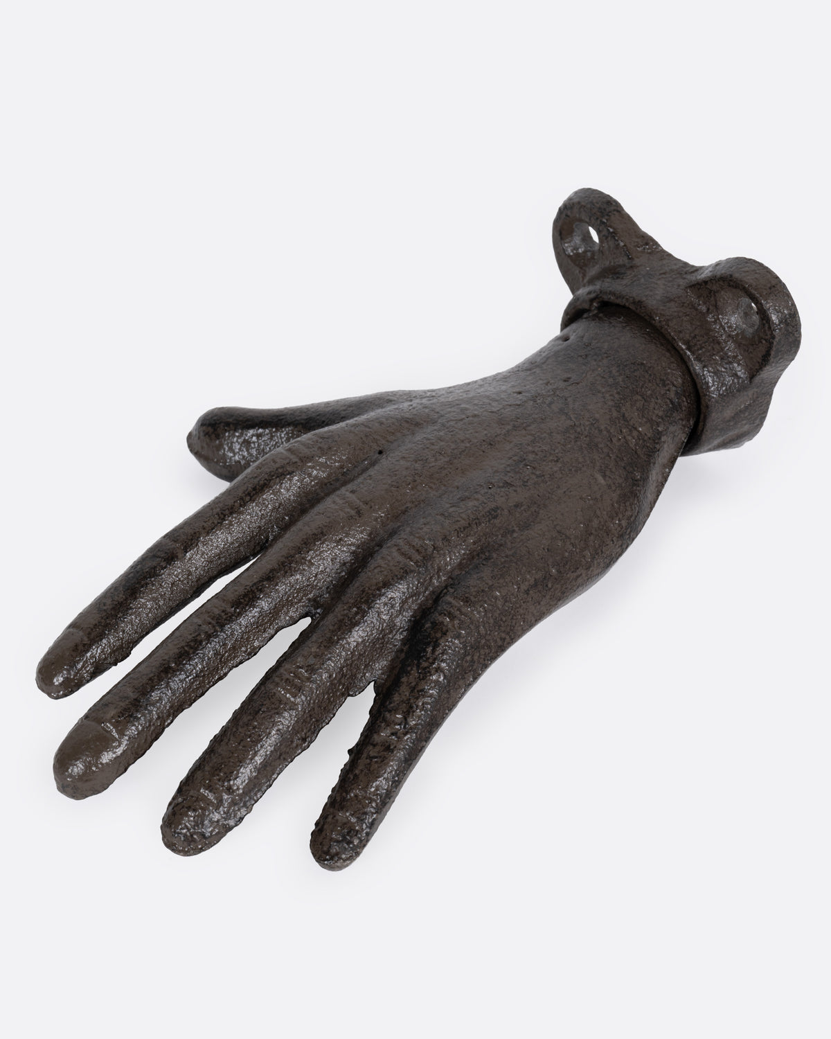 Vintage cast iron hand wall hook, side view
