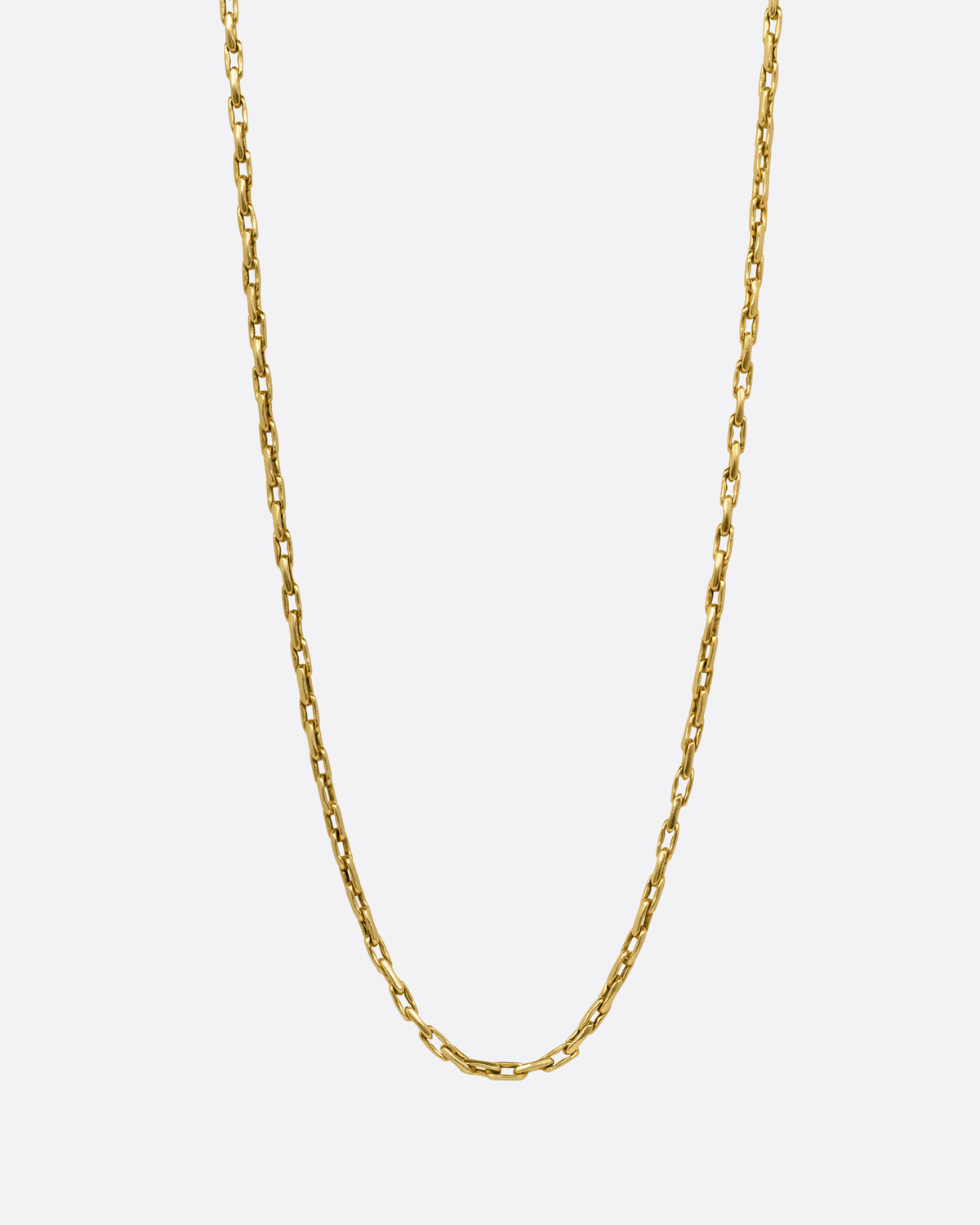 A yellow gold box chain with elongated links, shown from the front.