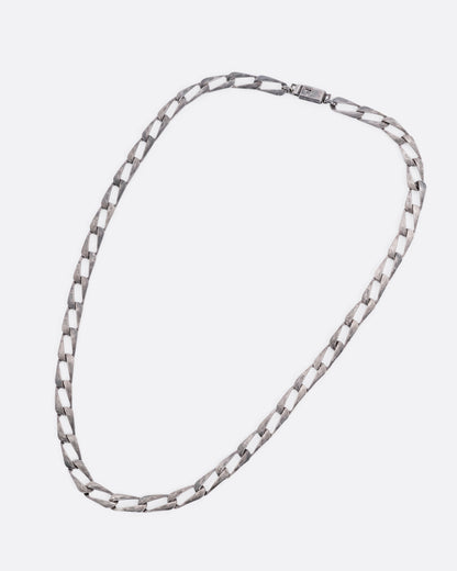 A silver chain with elongated oval links, shown from the front.