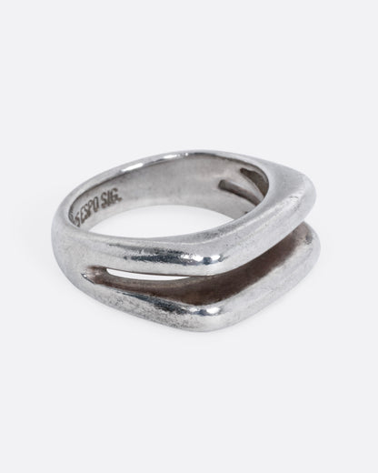 Vintage silver split face ring, angled view from the other side