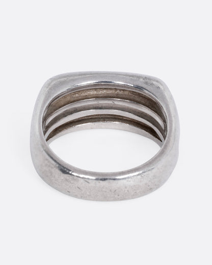Vintage silver split face ring, front view of the face