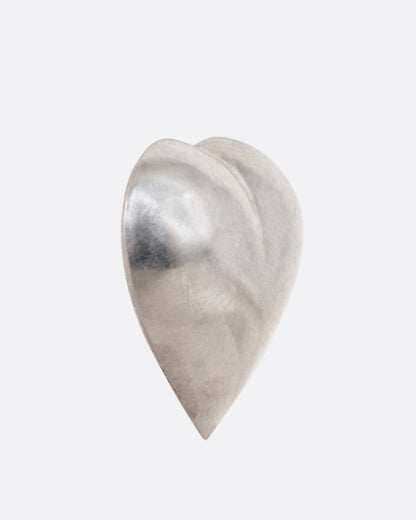 A silver heart shaped stud earring shown from the side.