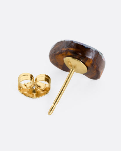 A heart-shaped boulder Australian opal stud earring, shown from the back open.