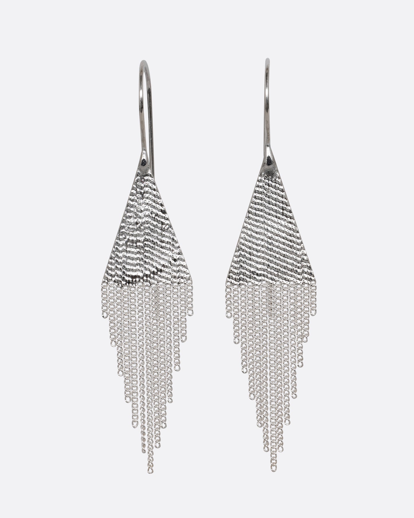 A pair of silver drop earrings with triangular tops and cable chain fringe bottoms. Shown from the front.