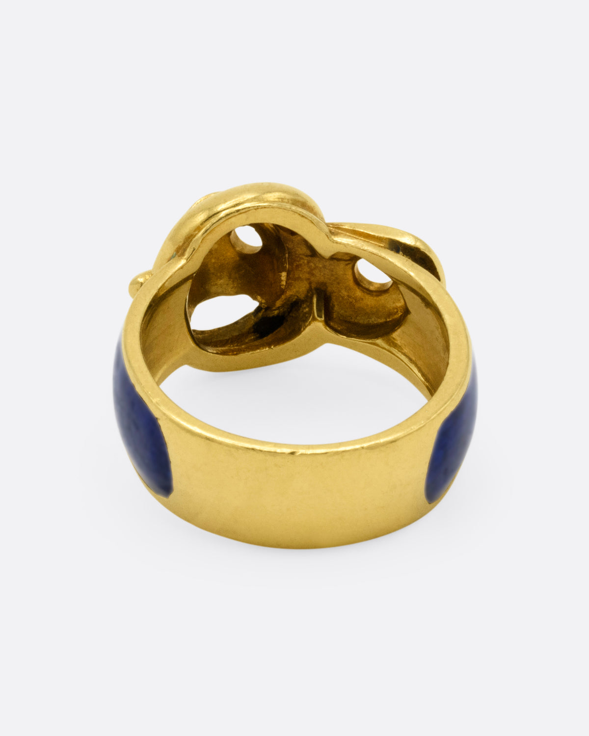 A yellow gold belt buckle ring with blue enamel, shown from the back.