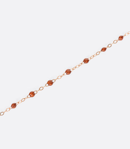 Rose gold resin bead bracelet, shown in brown resin