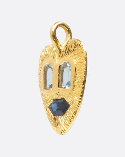 Yellow gold heart face pendant with aquamarine and sapphire, side view of the pendant and its bail