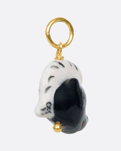 Porcelain skunk head charm, back of the charm