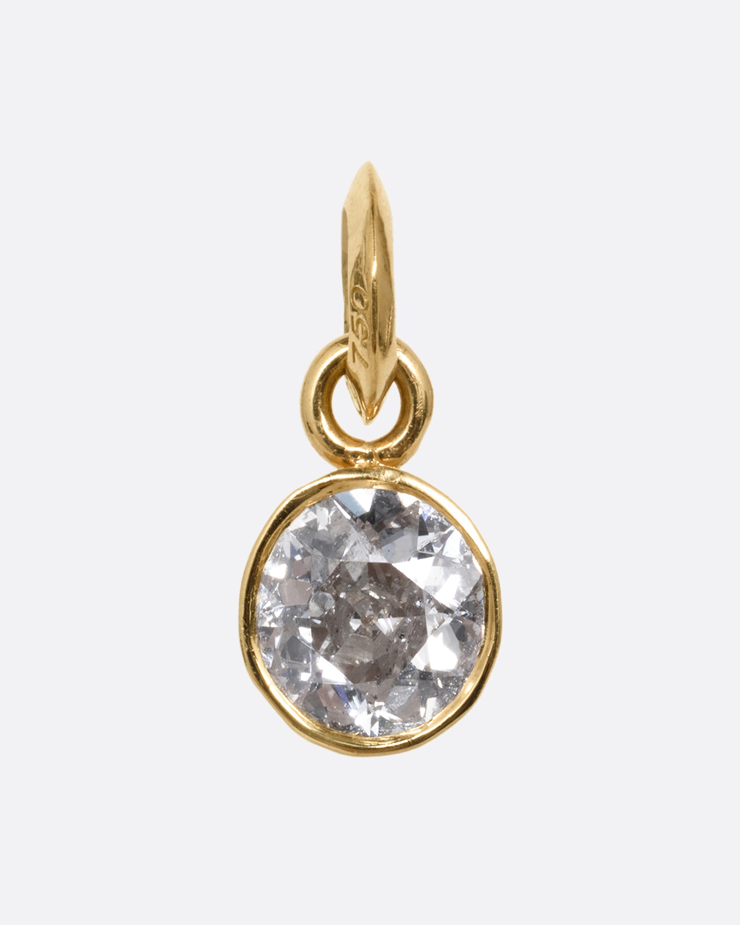 A round yellow gold pendant with an Old European cut diamond. Shown from the front.