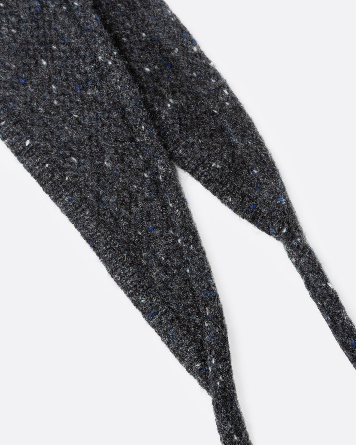 A close up of a donegal flecked charcoal hooded scarf.