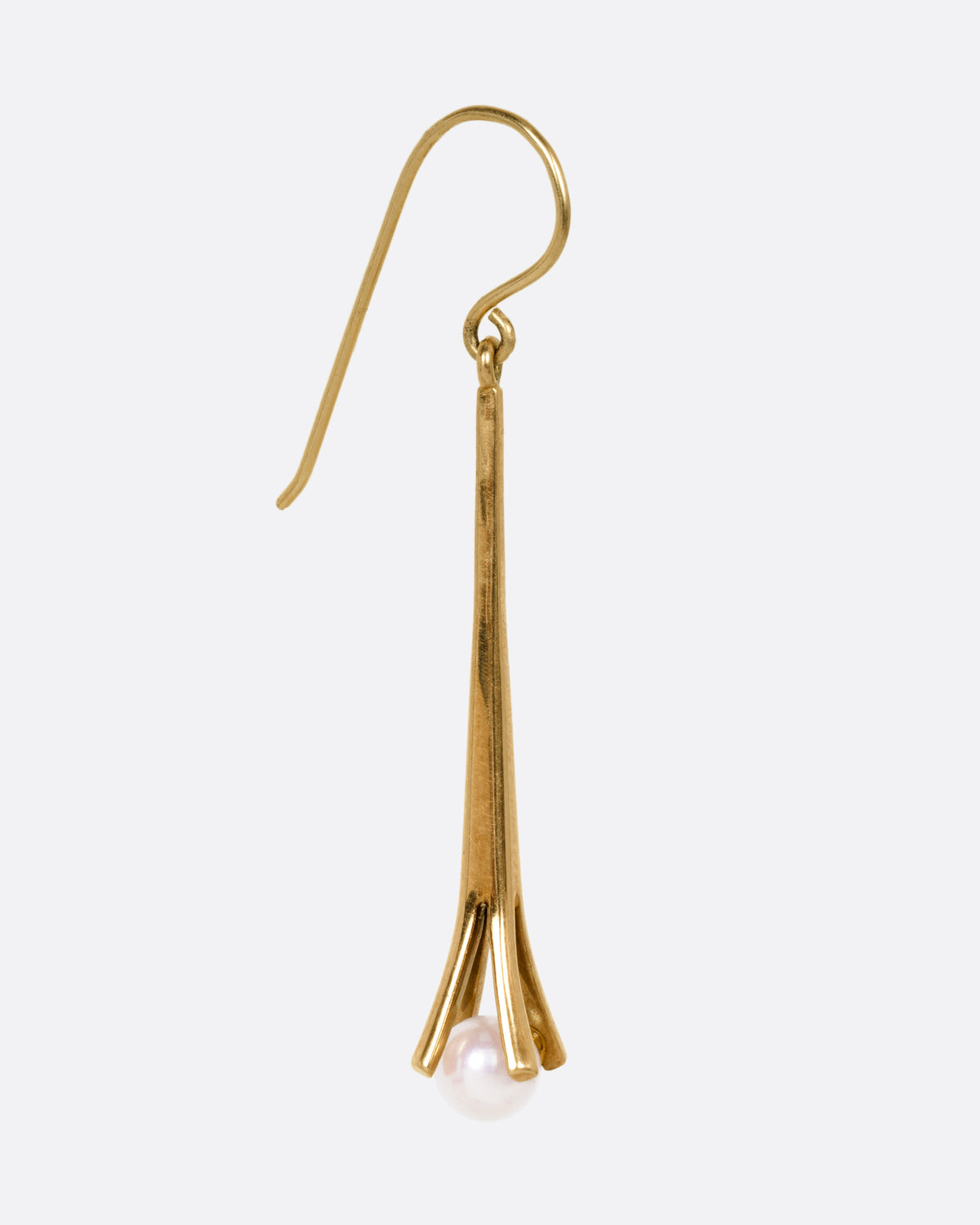 A yellow gold drop earring with a split vertical bar, and a single white pearl hanging from the bottom, shown from the side.