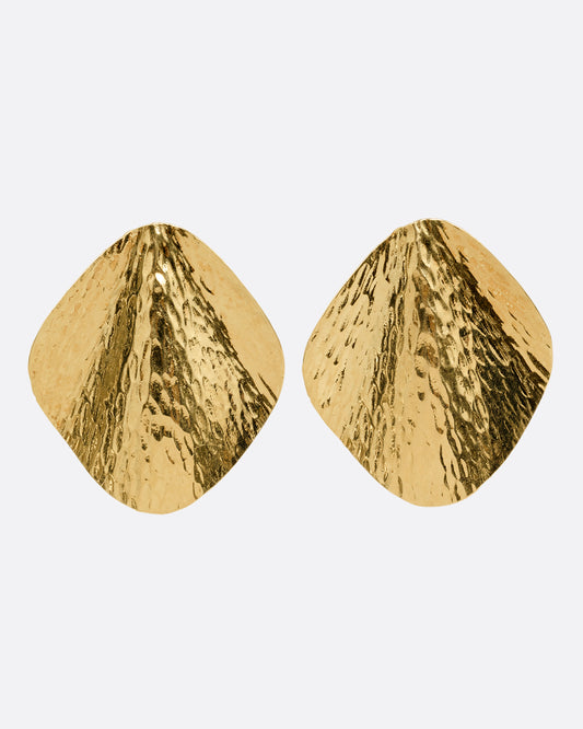 A pair of yellow gold stud earrings with a textural finish and wavy silhouette, shown from the front.