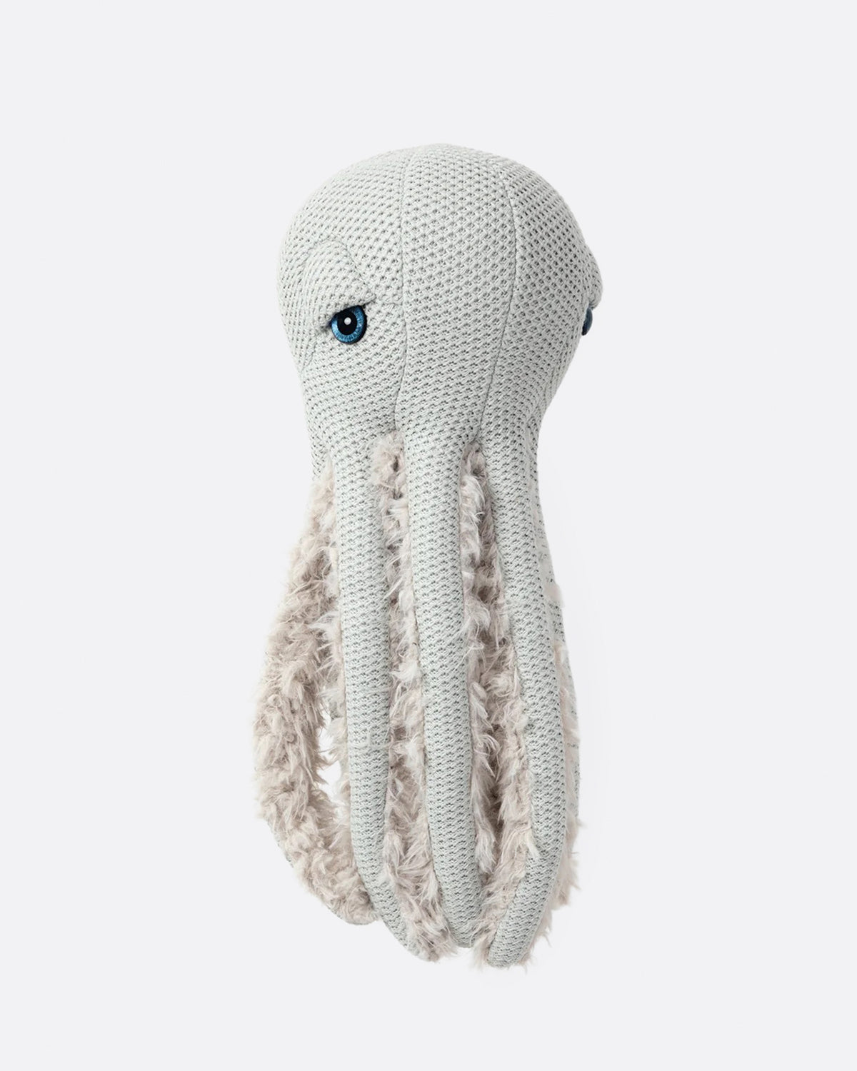 Small gray knit stuffed octopus with fluffy cream tentacles shown from the front.
