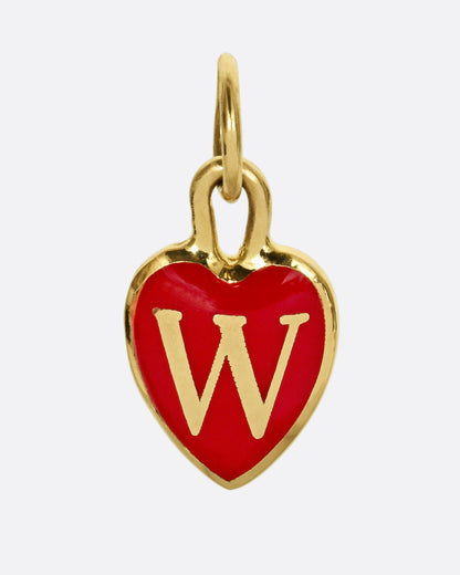 A yellow gold heart shaped pendant with red enamel and a W, shown from the front.