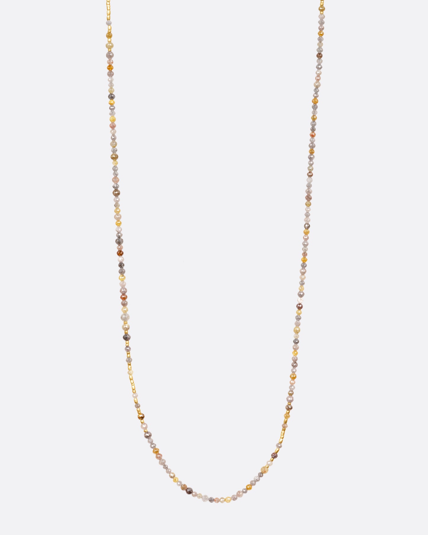 A  multicolored diamond beaded necklace with a yellow gold charm holder, shown from the front.