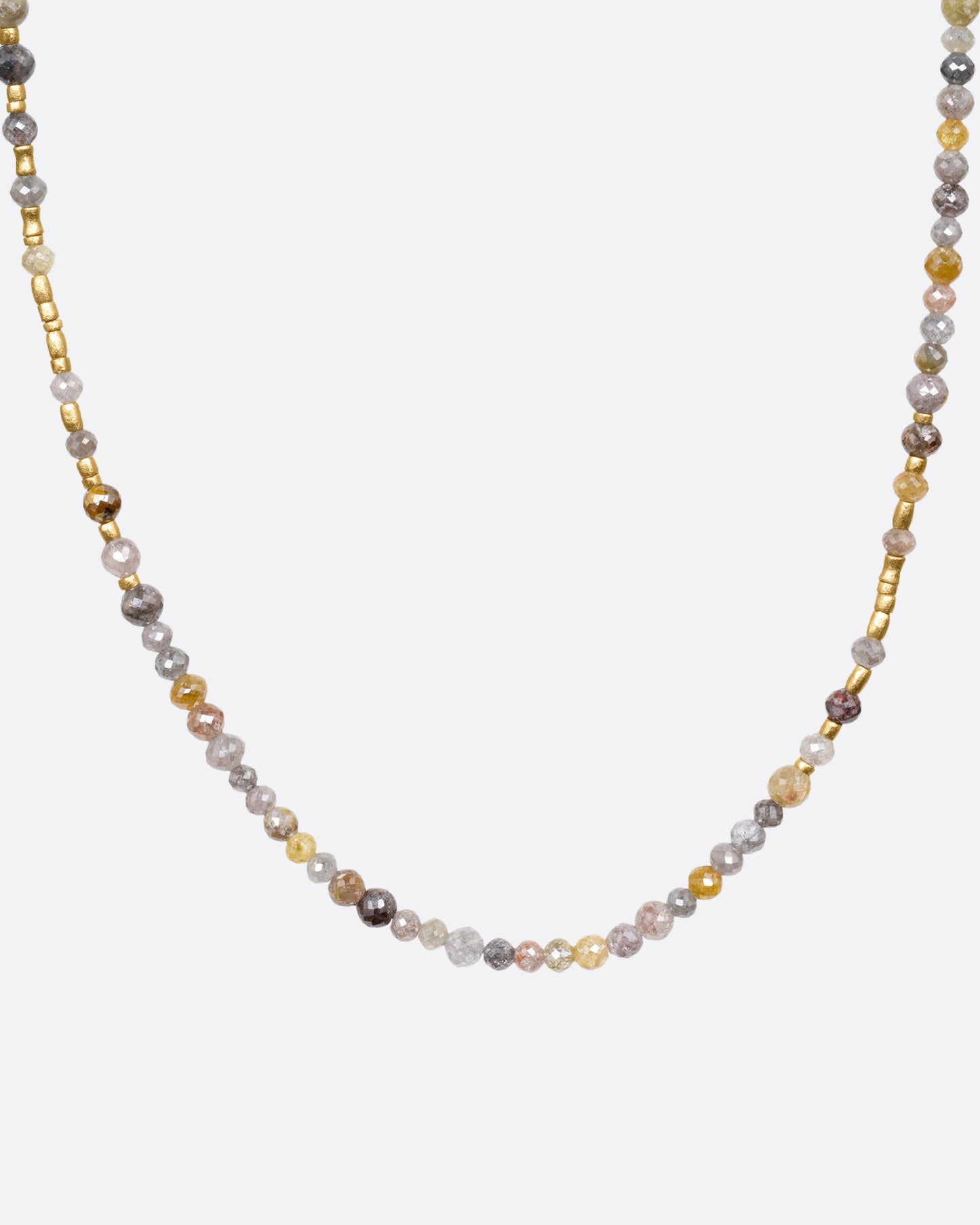A  multicolored diamond beaded necklace with a yellow gold charm holder, shown from the front.