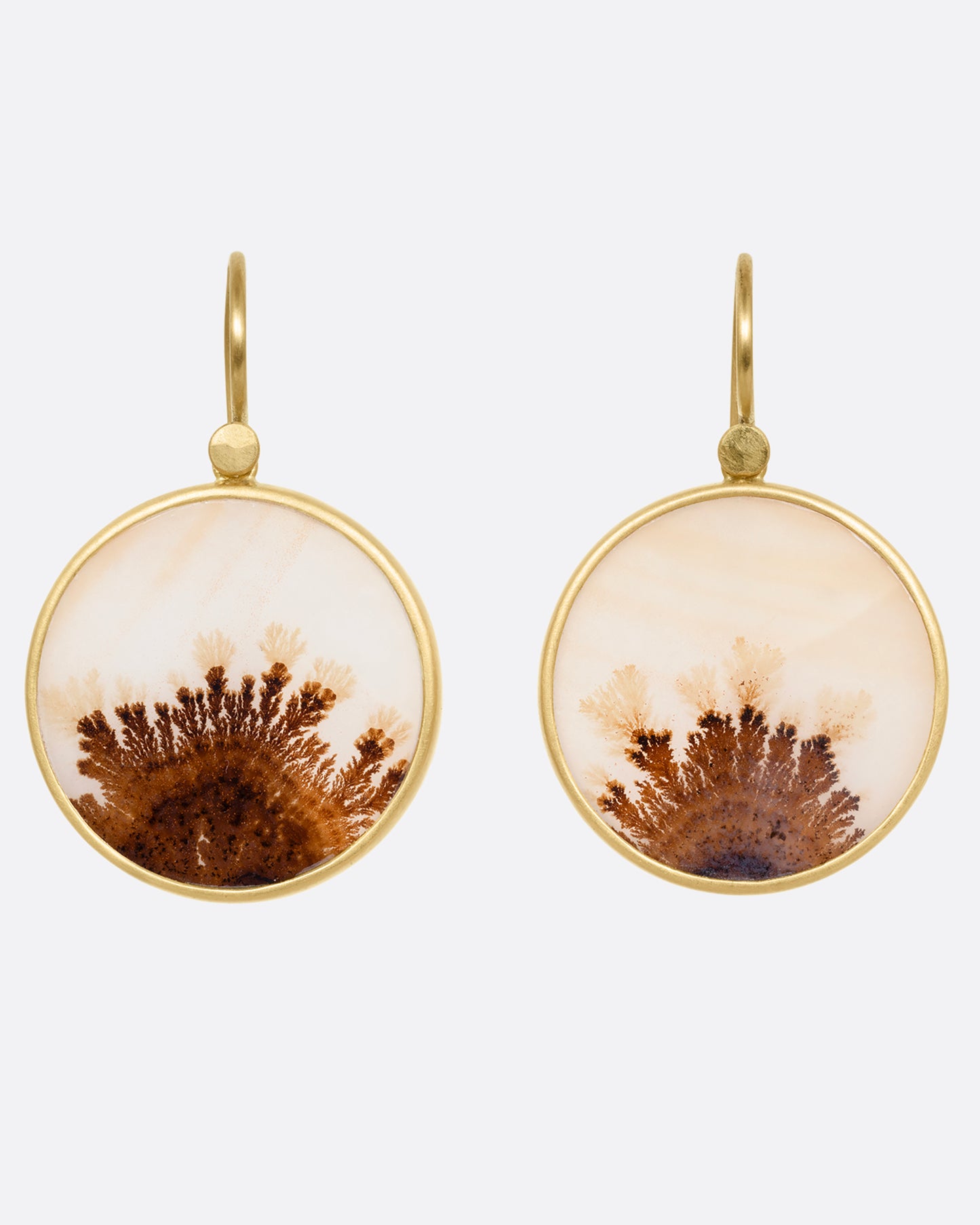 A pair of yellow gold dendritic agate earrings, shown from the front.