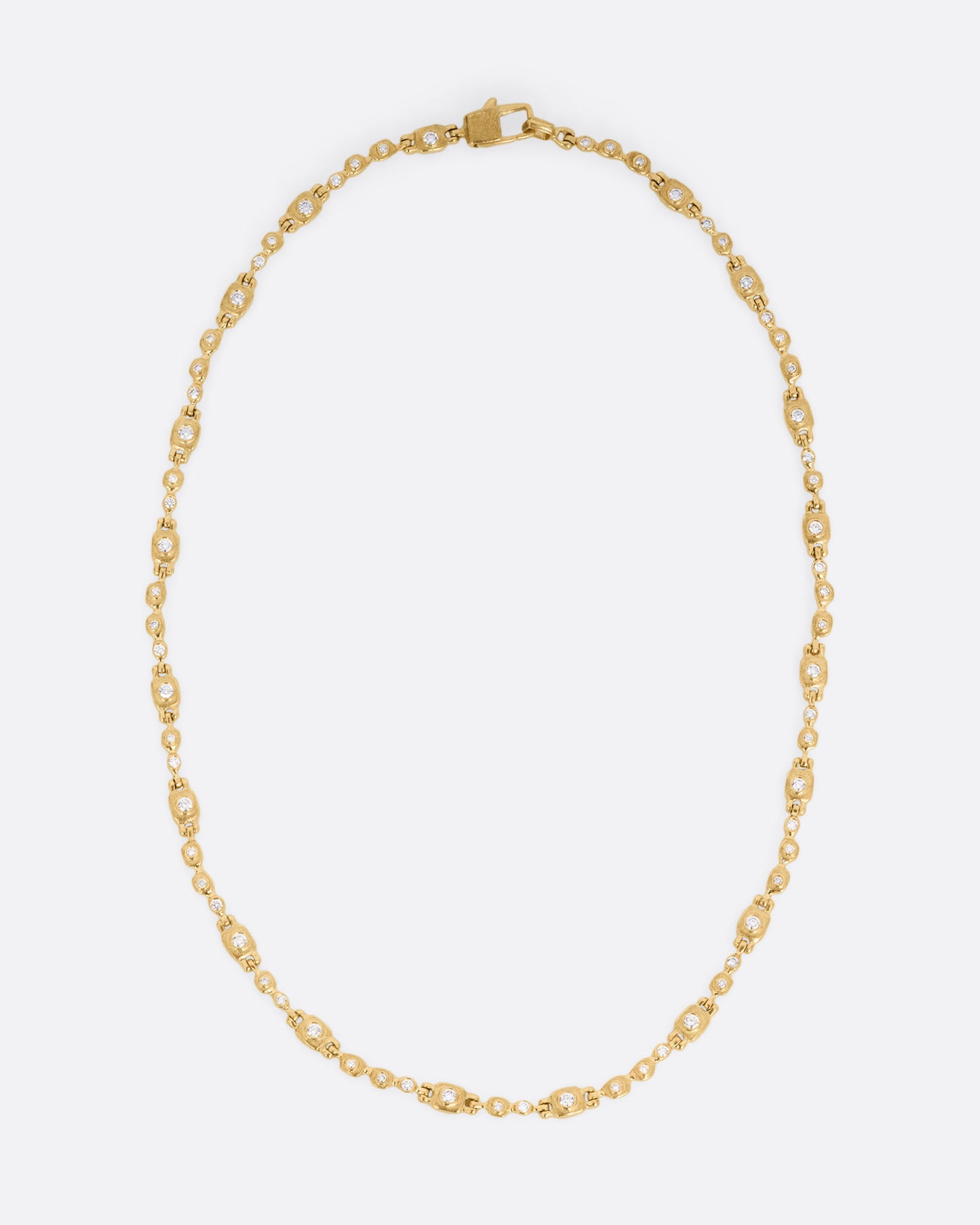 A yellow gold linked necklace with diamonds, shown from the front.