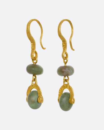 Yellow gold jade stirrup drop earrings, side view showing the hook wires