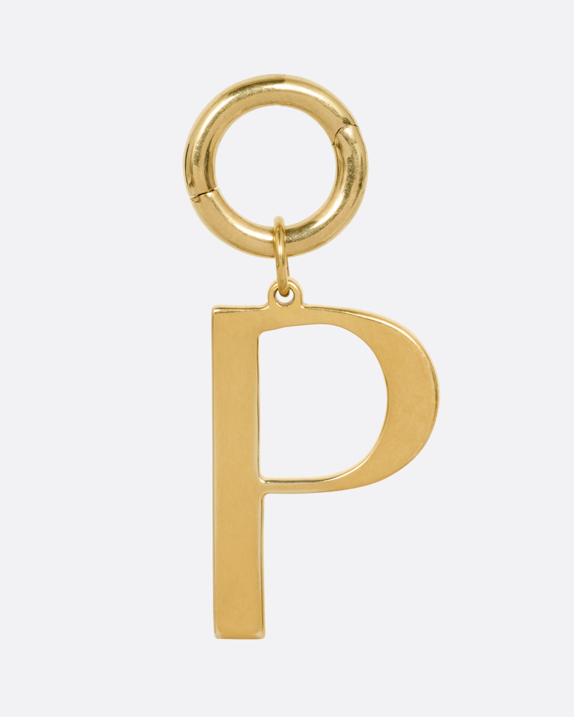 A yellow gold 'P' shaped pendant, shown from the front.