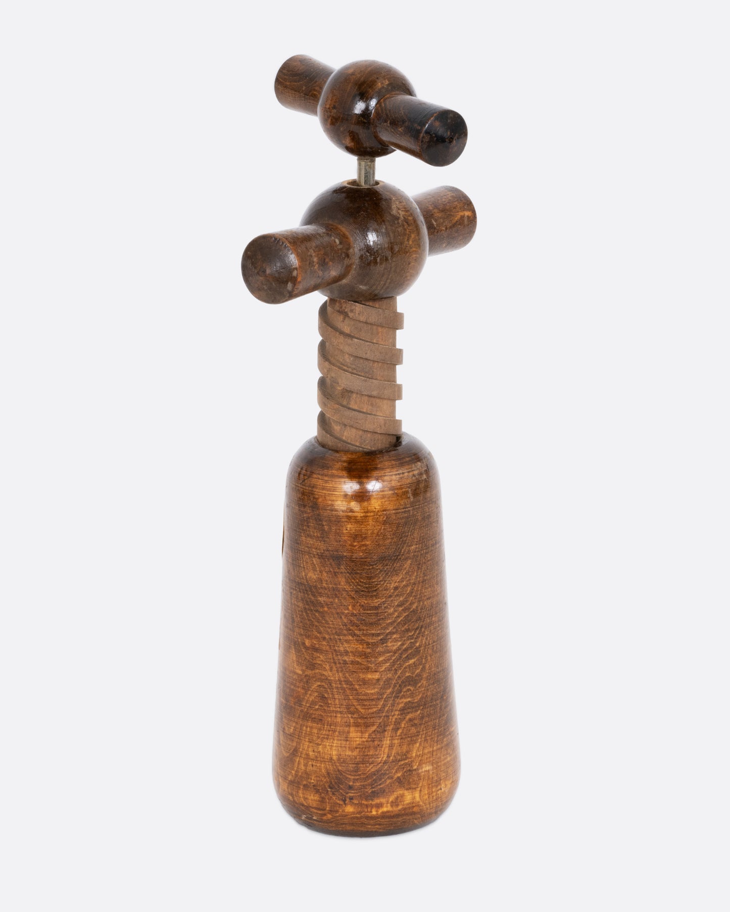 A wooden cork screw, shown from the side.