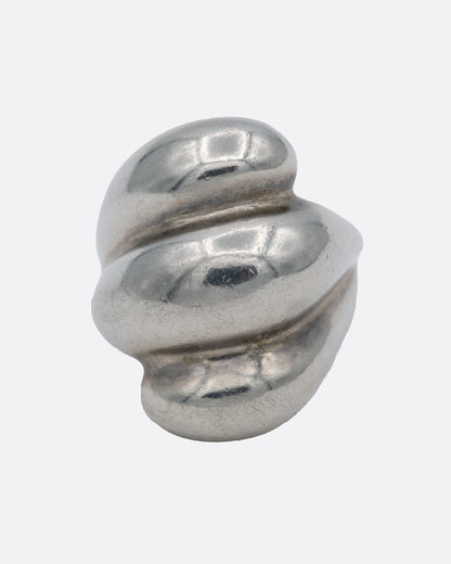 A silver ring with three domed tiers, shown from the front.