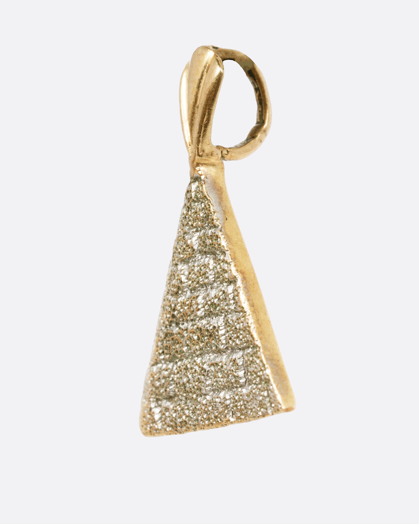 A yellow gold pyramid pendant shown from the side.